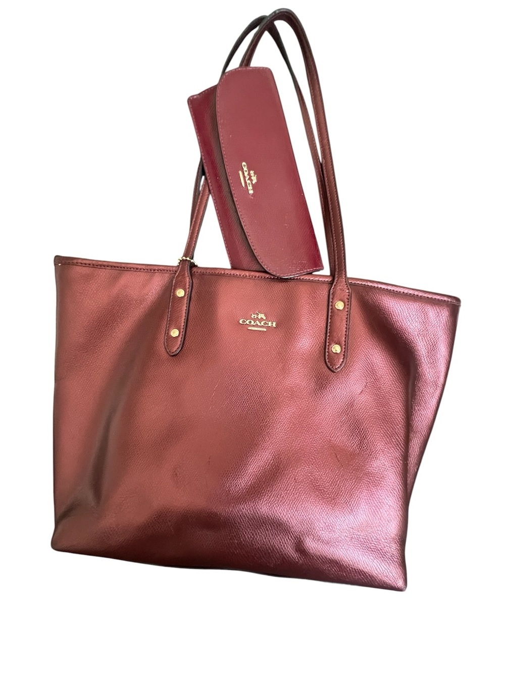 Coach City Zip Metallic Burgundy Leather Tote
And wallet